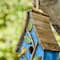 Glitzhome® 12.5" Distressed Wood Birdhouse with Leaves
